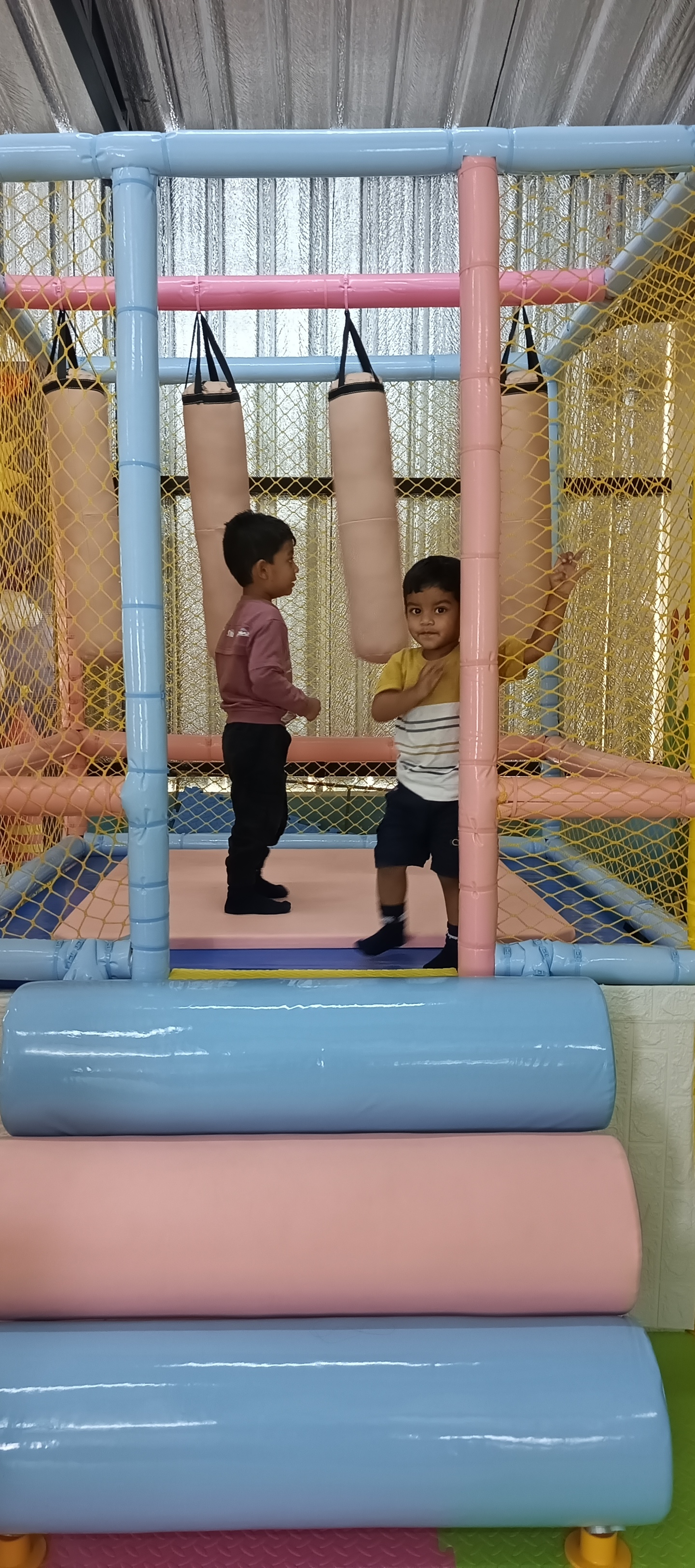 Kids engaging in physical active games in play zone